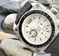 A watch is a small timepiece, typically worn either on the wrist or attached on a chain and...