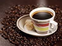 Coffee is a brewed beverage with a dark,...