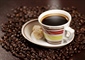 Coffee is a brewed beverage with a dark, acidic flavor prepared...